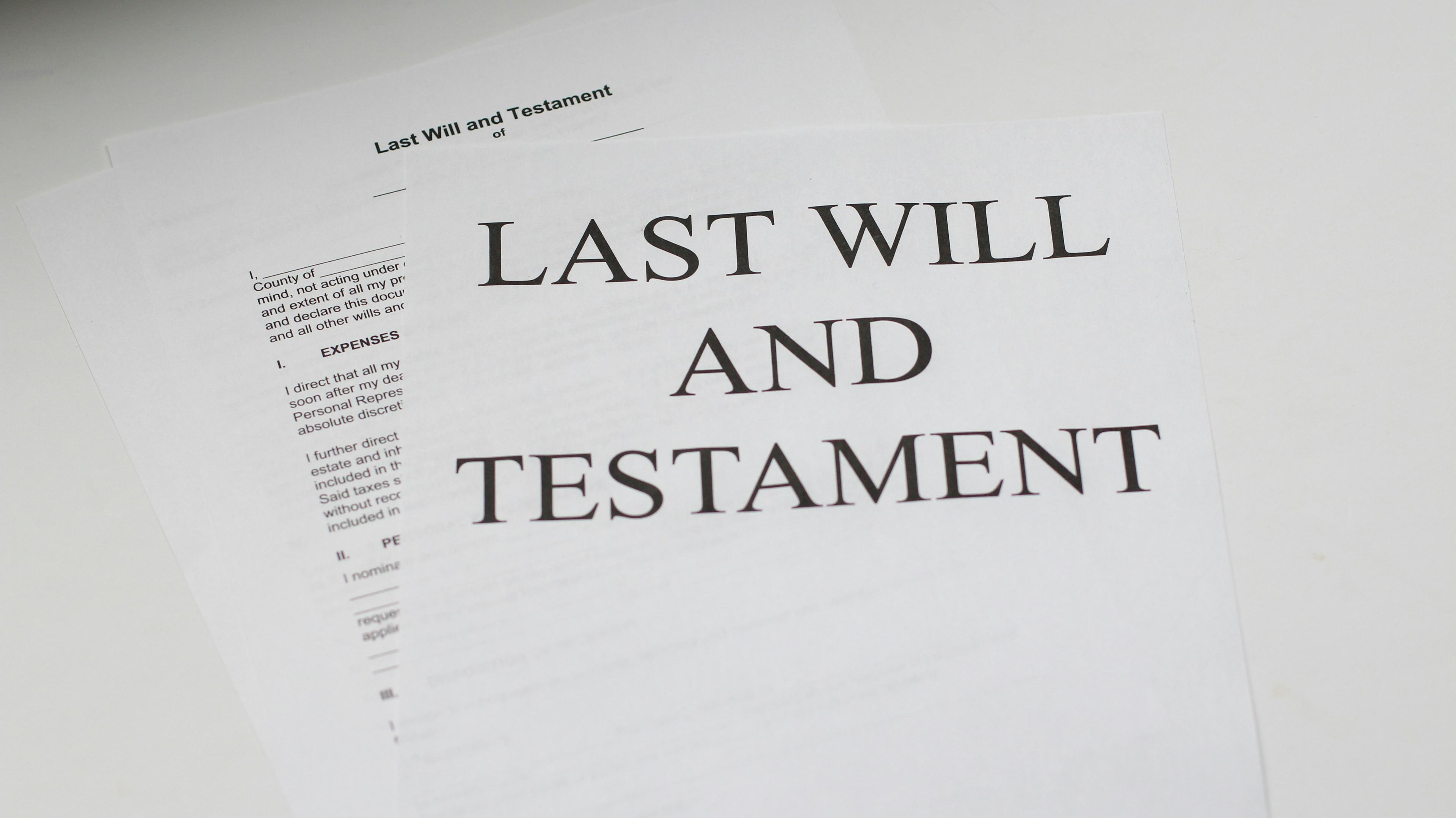 A family discussing estate planning and legacy documents with a Gulf Pacific Financial advisor